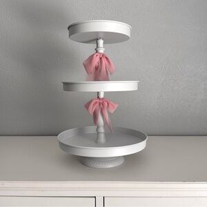 White Three-Tiered Stand with Pink Silk Bow Accents